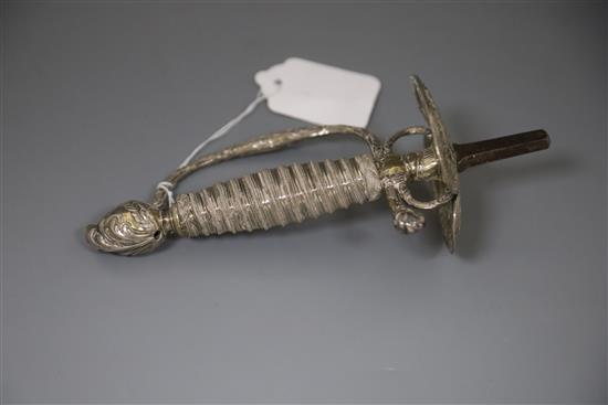 A 19th century Continental silver gilt sword hilt, 7.5in. x 3.5in.